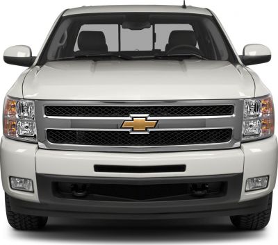 Front view showing grille, headlights, and mirrors