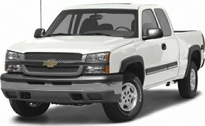 Pickup truck front view with grill, headlights, and bumper.