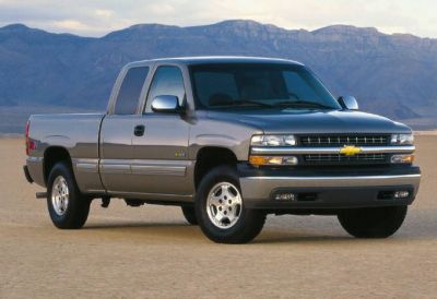 Front side view of extended cab full-size pickup truck
