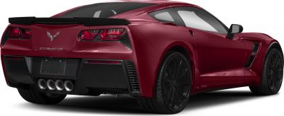 Rear view with quad exhaust pipes and black spoiler.