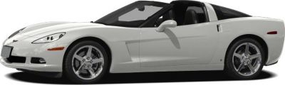 White sports coupe with targa top and alloy wheels