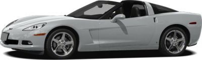 Silver two-door coupe with aerodynamic design and sporty wheels