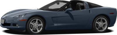 Side profile of a coupe with targa roof and five-spoke alloy wheels