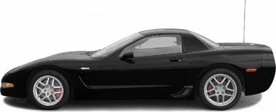 Black sports coupe with hard top and alloy wheels, side view