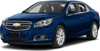 Blue sedan with prominent front grille and alloy wheels
