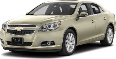 Front side view showing distinctive grille and headlights of a sedan