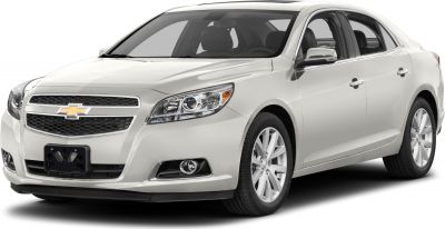 Front side view showing headlights, alloy wheels, fog lights, and sleek design.