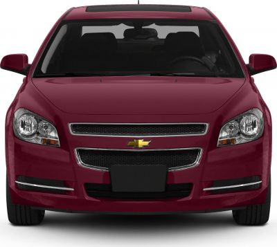 Front view of a sedan with distinctive grille and headlights