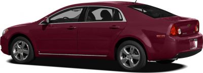 Side profile of a four-door sedan with alloy wheels and chrome trim