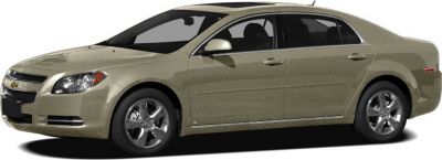 Side profile of a sedan with chrome wheels and smooth body lines