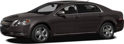 Side profile of mid-size sedan with chrome wheels and tinted windows