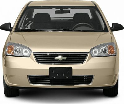 Front view of mid-size sedan with grille and headlights