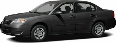Four-door sedan black side profile with alloy wheels and headlight details