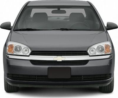 Front view showing headlights and chrome grille