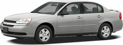 Silver midsize sedan with smooth lines and classic wheels side profile