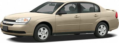 Side profile of mid-size sedan with alloy wheels and aerodynamic design
