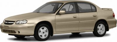 Four-door sedan with classic body style and smooth side profile.