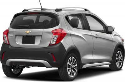 Rear three-quarter view with alloy wheels and roof rails