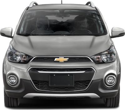 Front view with grille, headlights, fog lights, and roof rails.