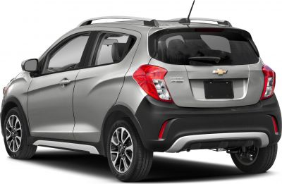 Rear view of compact hatchback with roof rails and alloy wheels