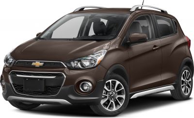 Front-side view of compact hatchback with distinct grille and alloy wheels