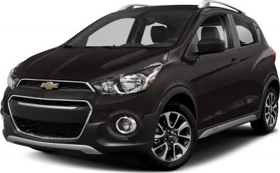 Front-side view with fog lights, alloy wheels, and roof rails