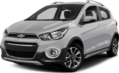 Front-side view of compact hatchback with distinctive grille and roof rails