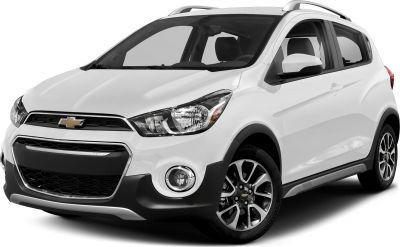 Front side view with alloy wheels, fog lights, and roof rails