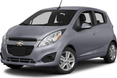 Compact hatchback front-side view with distinctive grille and headlights