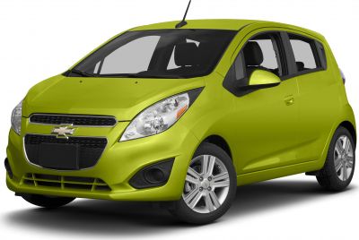 Compact hatchback car front 3/4 view with detailed headlights and grille