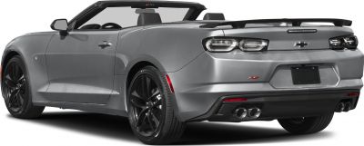 Rear and side view of a convertible with quad exhaust and black rims