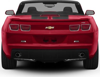 Rear view with RS badge, dual exhausts, wide tires, and distinctive taillights