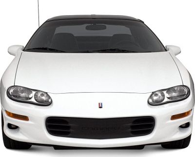 Front view with dual rounded headlights and aerodynamic hood