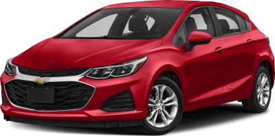 Red hatchback front view with prominent grille and headlights