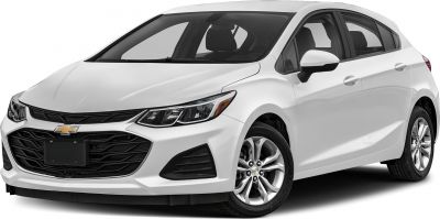 Front-angle view showing sleek headlights, grille, and alloy wheels of a hatchback