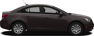 Side profile of a compact four-door sedan with alloy wheels and dark paint