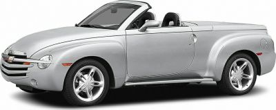 Retro-styled convertible pickup with smooth curves and distinctive front grille.