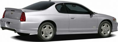 Silver two-door coupe with SS badge and alloy wheels from rear side angle.