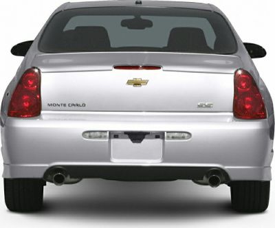 Rear view with dual exhaust and distinct taillights