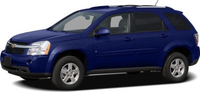 Side view of a blue mid-size SUV with alloy wheels and roof rails