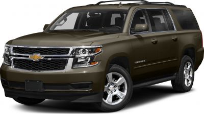 Bold front grille and large SUV body with roof rails