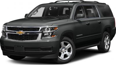 Front and side view of a large SUV with distinctive grille and headlights