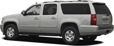 silver full-size SUV side profile with tinted windows and alloy wheels