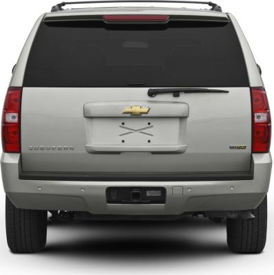 Rear exterior view with tailgate, rear lights, rear wiper, and tow hitch