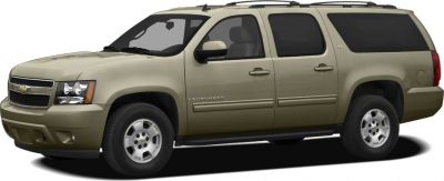 Beige SUV side profile with roof rails and front grille.