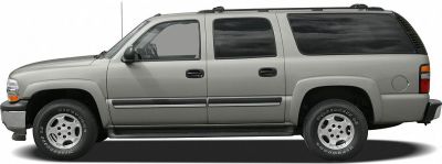 Silver full-size SUV side profile with six doors