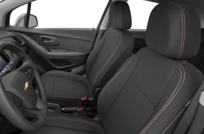 Fabric front seats with orange stitching and round pattern upholstery.