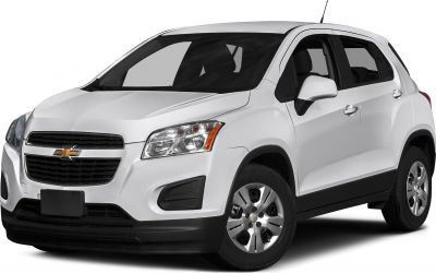 Front side view of compact white SUV with distinct headlights and grille