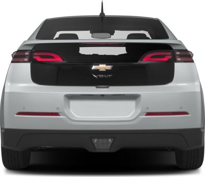 Rear view with distinctive tail lights and rear window design