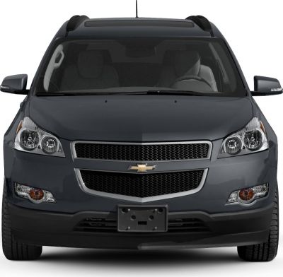 Front view of SUV with grille, headlights, and roof rails
